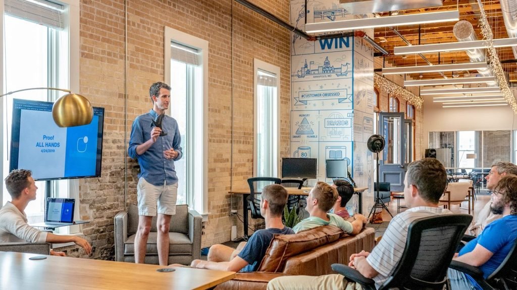 Small team discussing marketing plans in a meeting